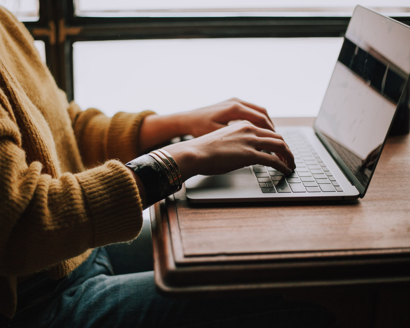 Wall sign in a Hotel showing the slogan: No risk, more done! #MeetingTheChallenge