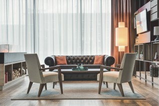 A seating arrangement in the contemporary lounge area of an IntercityHotel.